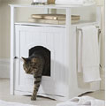 white wood dog bed or cat litter enclosure and end table